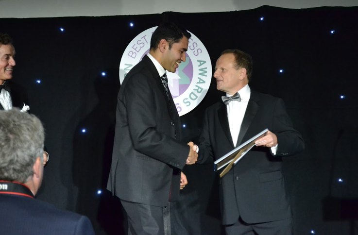 Sahaj Kothari receiving Entrepreneur of the Year award